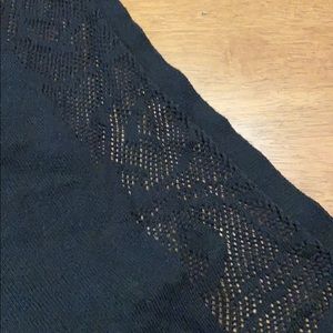 Black “lace” panels draped opening sweater